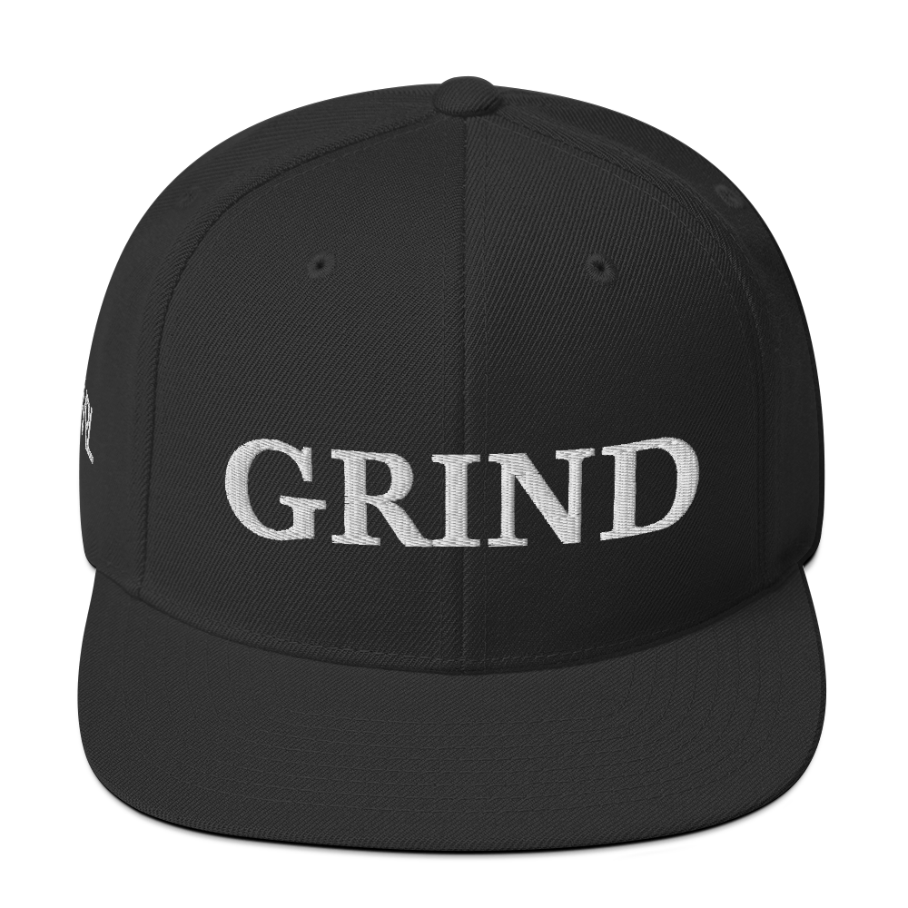 black "grind" snapback hat with white letters 