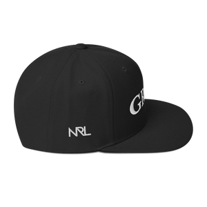 black "grind" snapback hat with white letters