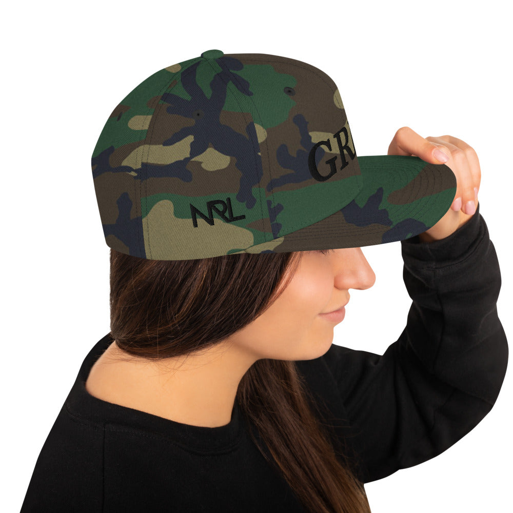 camo "grind" snapback hat with black letters 