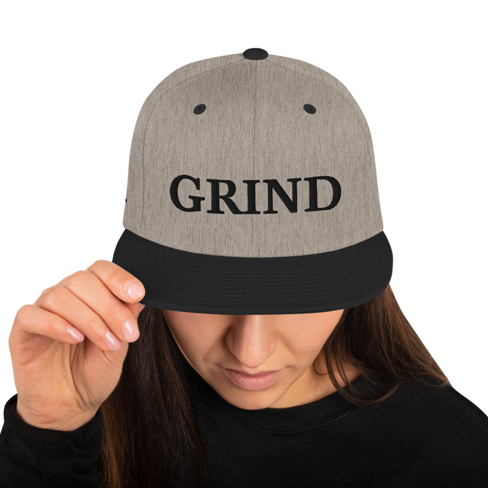 heather "grind" snapback hat with black letters  and black brim