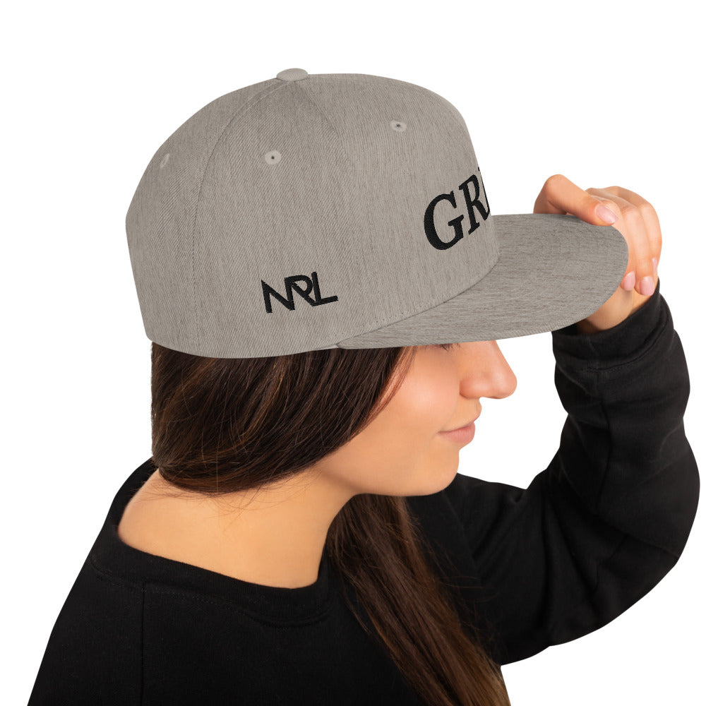 heather "grind" snapback hat with black letters 