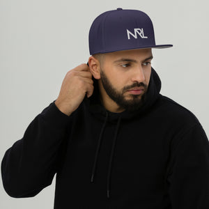 Navy snapback hat with white New Regular Lifestyle logo 